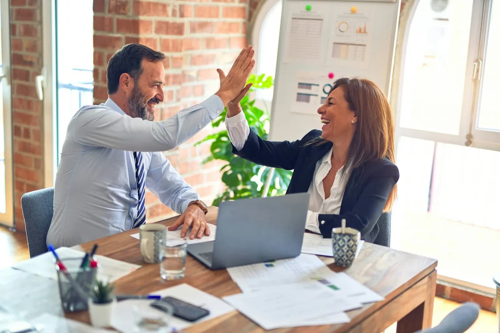 Business professionals collaborating on a property development project